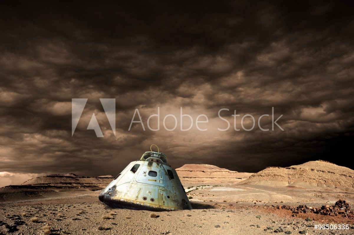 Picture of A scorched space capsule lies abandoned on a barren world - Elements of this image furnished by NASA